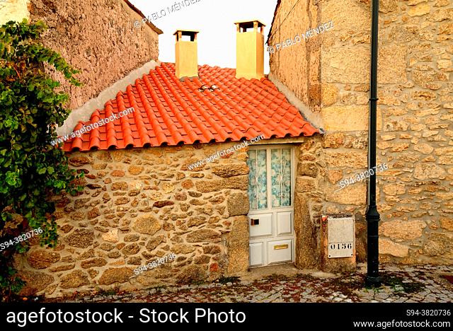 Small house fit between buildings, Bemposta, Mogadouro, Portugal