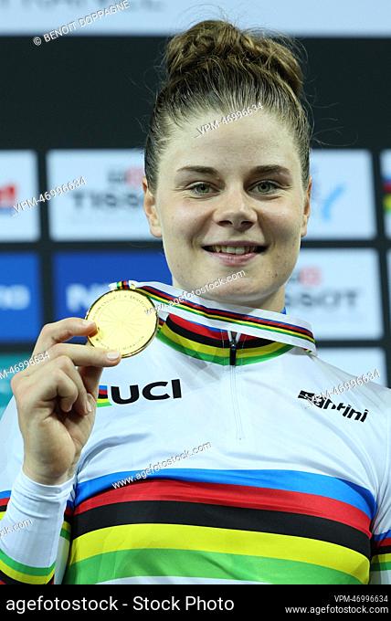 Belgian Lotte Kopecky celebrates with her gold medal on the podium at the Women's elimination race track cycling event at the 2022 world championships track...