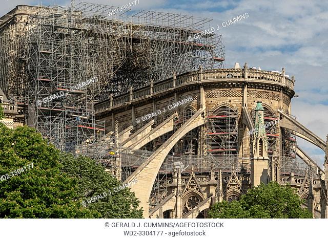 PARIS, FRANCE - 19 APRIL 2019 Notre Dame cathedral, after the timber roof caught fire. The melted scaffolding, constructed for the exact purpose of restoring...