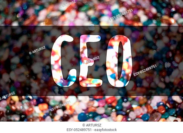Text sign showing Ceo. Conceptual photo Chief Executive Officer Head Boss Chairperson Chairman Controller Blurry candies candy ideas message reflection sweets...