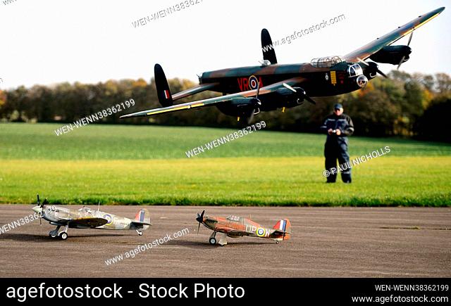 We will remember them : Steve Holland, Cotswold Radio Control Society, flying his fifth scale model Lancaster over a model Spitfire and a Hurricane in tribute...