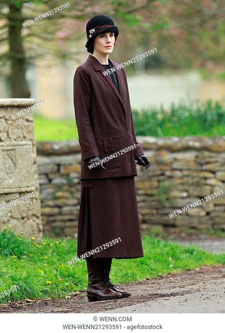 The cast of Downton Abbey film scenes on location outside a churchyard Featuring: Michelle Dockery Where: Bampton, United Kingdom When: 24 Apr 2014 Credit: WENN