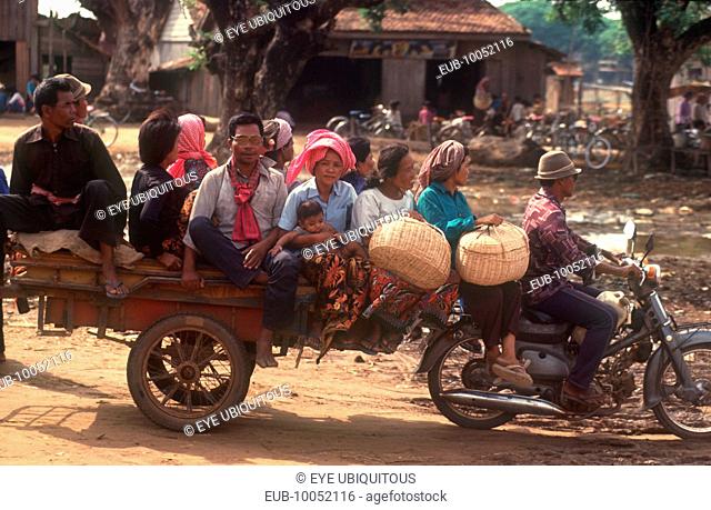 The market motorbike taxi and passengers