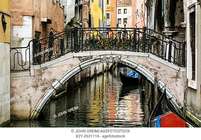 Charming canal and footbridge, Sotoportego del Cavalletto, Venice, Italy