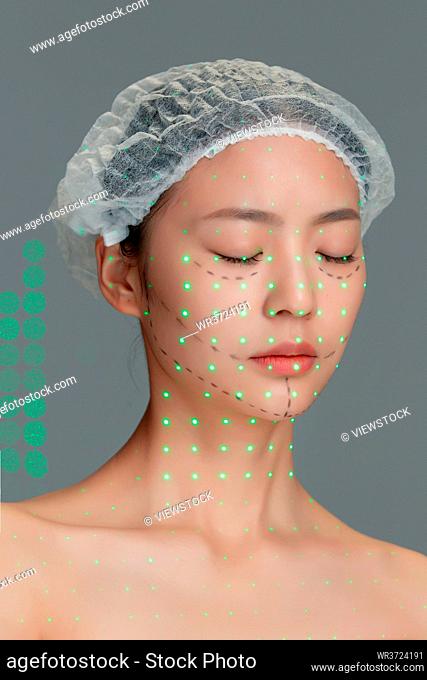 Young woman do laser cosmetic