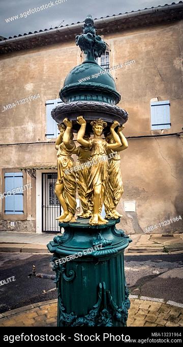 Original Wallace fountain in Coursan. Designed by the sculptor Charles Auguste Lebourg and identical to those in Paris. Erected in the XIX century