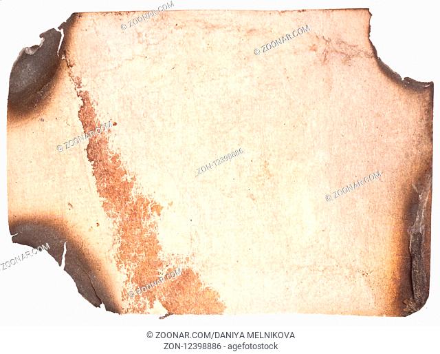 Old paper with burned edges on white background