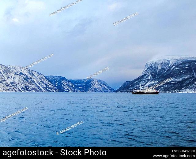 Ferry boat in Lærdal Fodnes in Vestland, Norway. In the winter fjord landscape