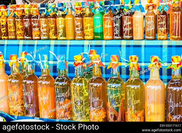 Sainte-Anne, Grande-Terre, Guadeloupe - November 8th, 2018: Arranged rum bottles on a local market