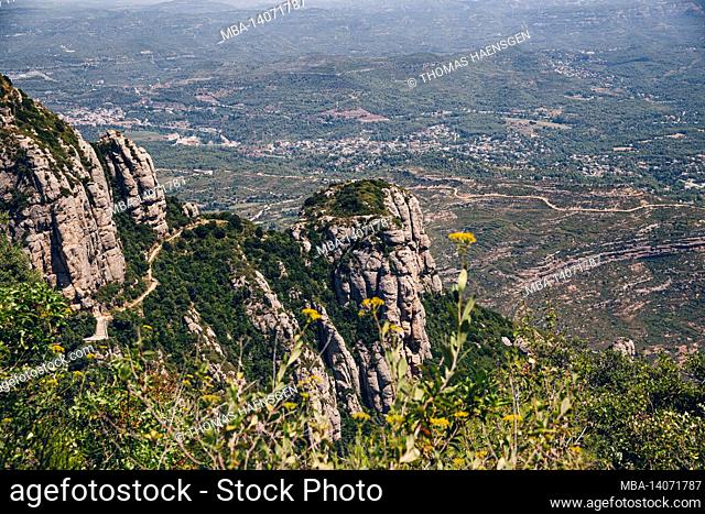 the mountains of montserrat in barcelona, spain. montserrat is a spanish shaped mountain which influenced antoni gaudi to make his art works