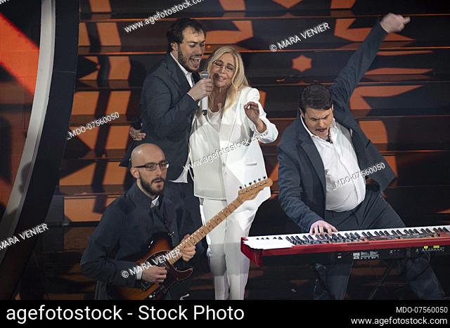Italian tv host Mara Venier and the band of the Pinguini Tattici Nucleari during the episode of Domenica In dedicated to 70th Sanremo Music Festival