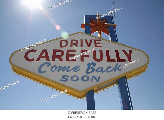 USA, Nevada, Las Vegas road sign against blue sky, low angle view