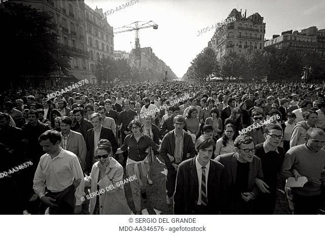 The risk of a revolution in Paris has been averted. View of the crowd of a huge demonstration of young people on a boulevard of Paris