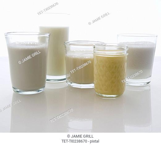 Close up of glasses with different kinds of milk