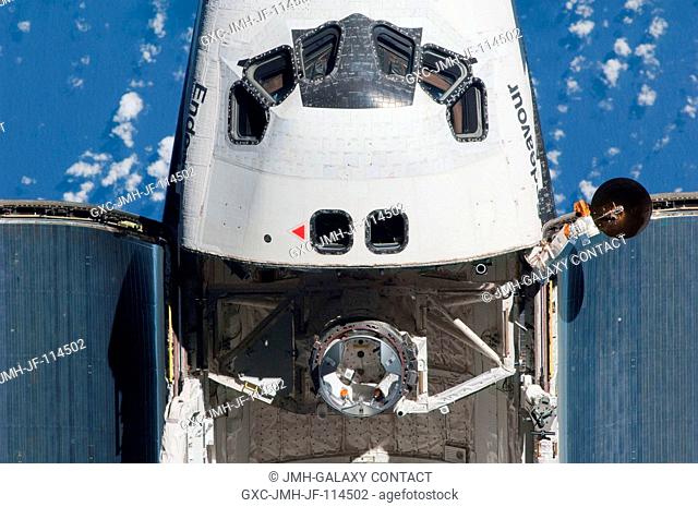 This partial view of the crew cabin and forward payload bay of the space shuttle Endeavour was provided by an Expedition 22 crew member during a survey of the...
