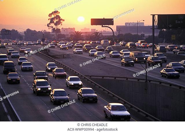California, Los Angeles, freeway traffic at sunset