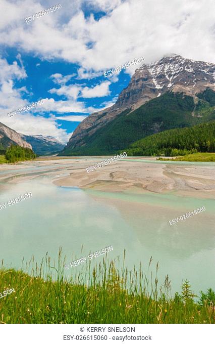 Landscape of Mount Stephen with the Kicking Horse river in the foreground