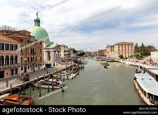Overview from the Scalzi Bridge. In the background the dome of the Church of San Simeon Piccolo. Venice (Italy), May 31st, 2021