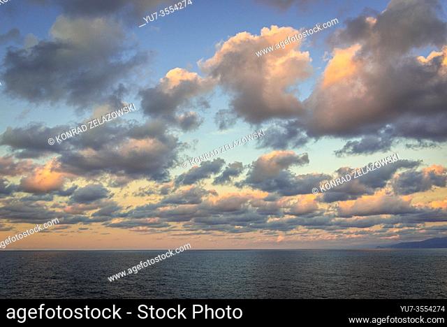 Sunset sky over Promontory of Capo Zafferano on the Tyrrhenian Sea in the municipality of Santa Flavia on Sicily Island in Italy