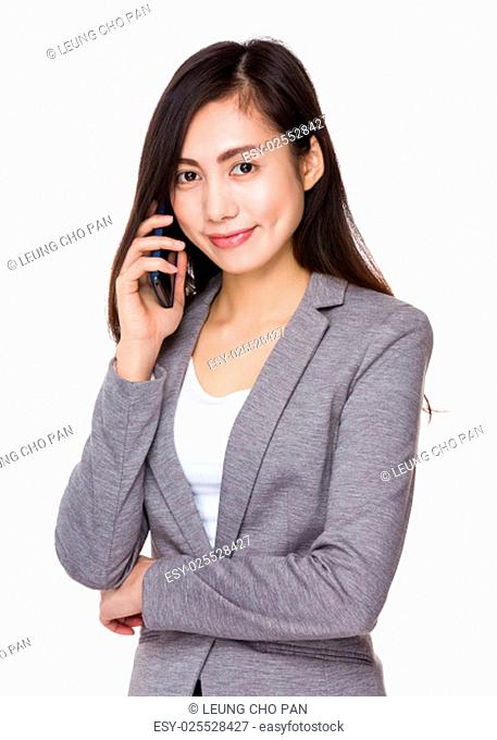 Asian businesswoman talk to mobile phone