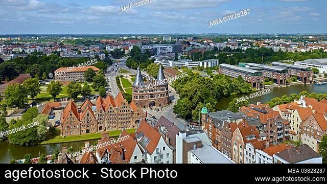 View of the salt reservoir and Holstentor on the river Trave, Hanseatic City of Lbeck, Schleswig-Holstein, Germany