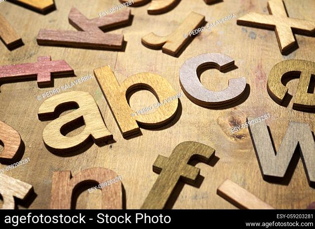 Wood letters on a wood table