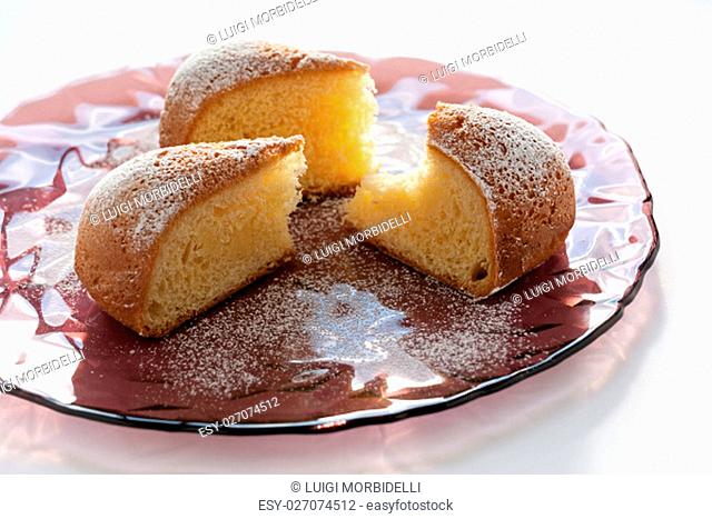 Slices of cake over a plate on a white background
