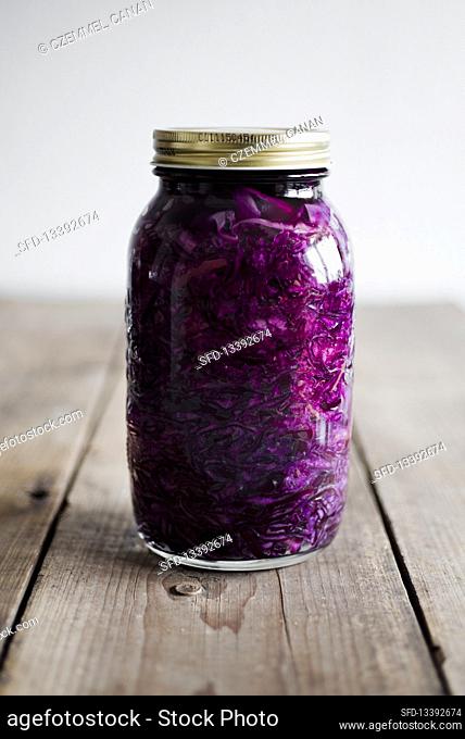 A jar of homemade red sauerkraut