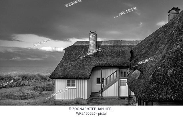 Baltic Sea - Historical thatched Roof house at the dune