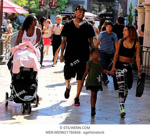 Chris Brown seen with girlfriend Karrueche Tran and friends at The Grove. They lunched at La Piazza Ristorante then headed for Nordstrom's to shop before...