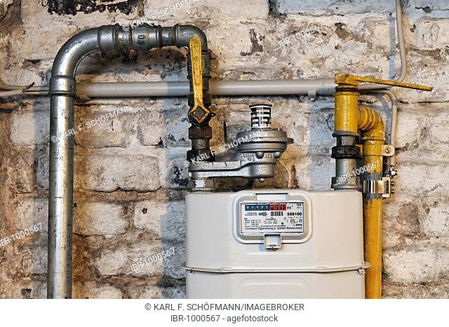 Gas meter and gas mains in a house cellar, natural gas heating system prior to modernisation, Germany, Europe