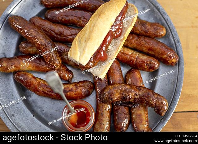 Bratwurst and hot dog with bratwurst on a plate