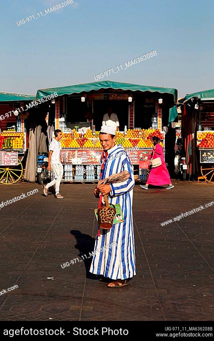 Man standing on Jemaa El Fna square, Marrakesh, Morocco
