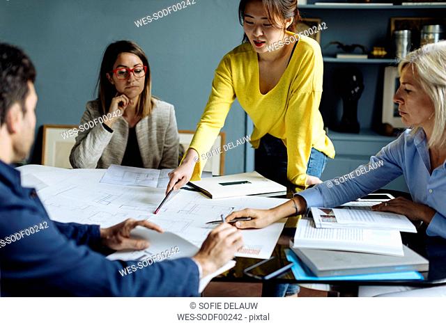 Architects having a meeting, discussing a project