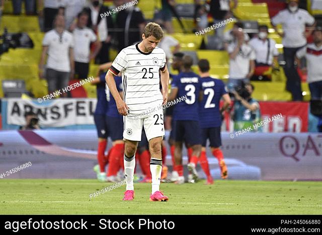 Thomas MUELLER (MÃ-ller, GER) disappointed after the match goal to make it 1-0, the FRA players in the back cheer. Group stage, preliminary round group F