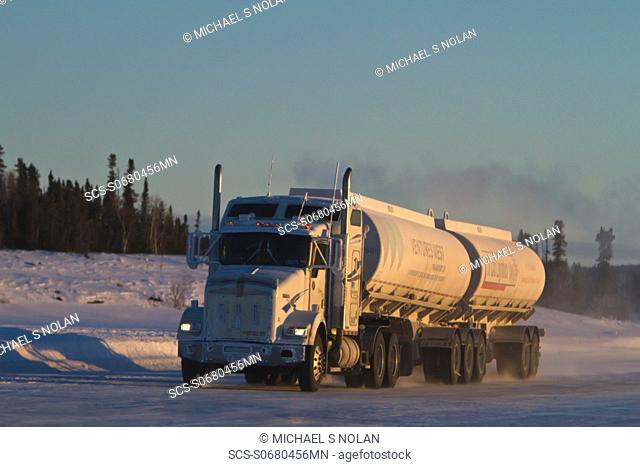 Heavy trucks on the ice road from Tibbitt to Contwoyto beginning just outside of Yellowknife, Northwest Territories, Canada MORE INFO This seasonal ice road is...