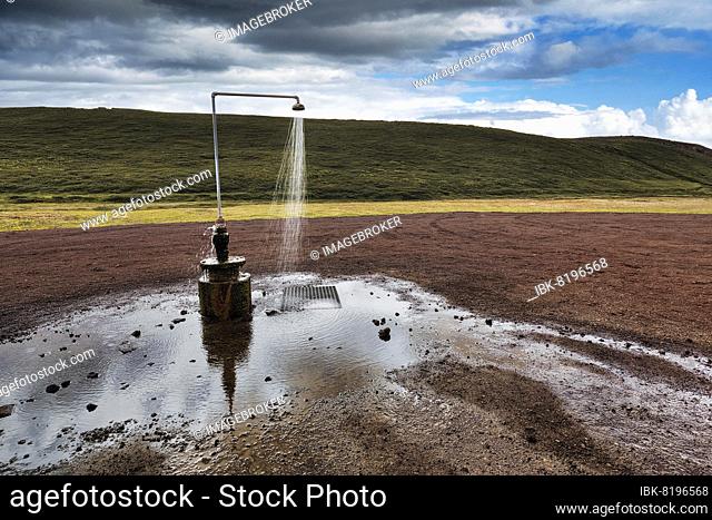 Free-standing hot shower without drain, gravel site near Krafla volcano, Myvatn, North Iceland, Iceland, Europe