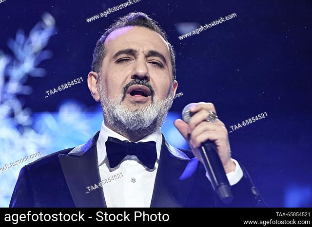 RUSSIA, MOSCOW - DECEMBER 17, 2023: Azerbaijani baritone Elchin Azizov performs during a New Year concert at the MTS Live Hall. Sofya Sandurskaya/TASS