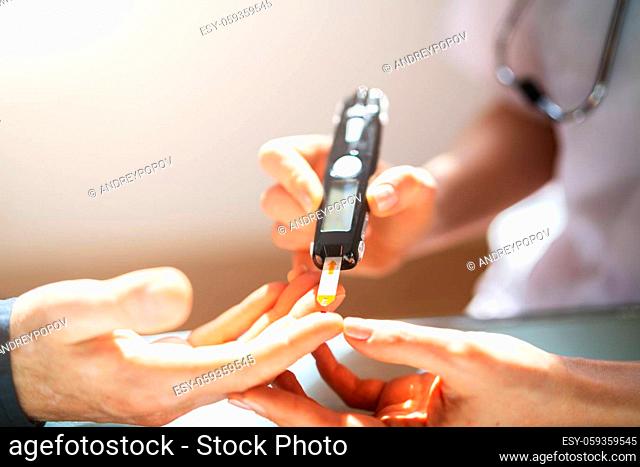 Diabetes Blood Sugar Check For Man By Doctor