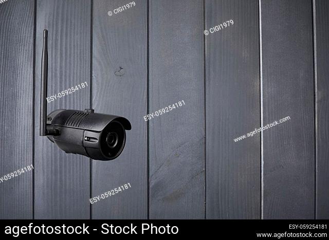 Video surveillance system using wifi security camera with night vision installed on a wall