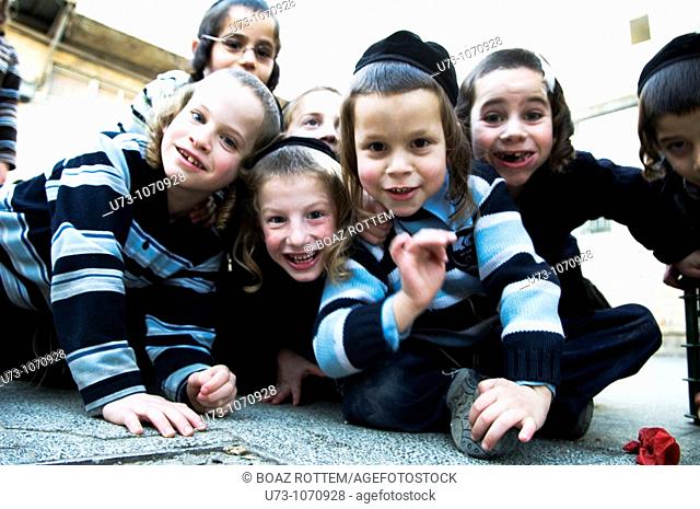 cute Jewish orthodox boys having fun with the camera in their Yeshiva / school in the religious neighborhood of Mea Shearim in Jerusalem