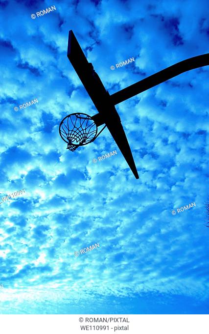Basketball Hoop in Dawn's Sky