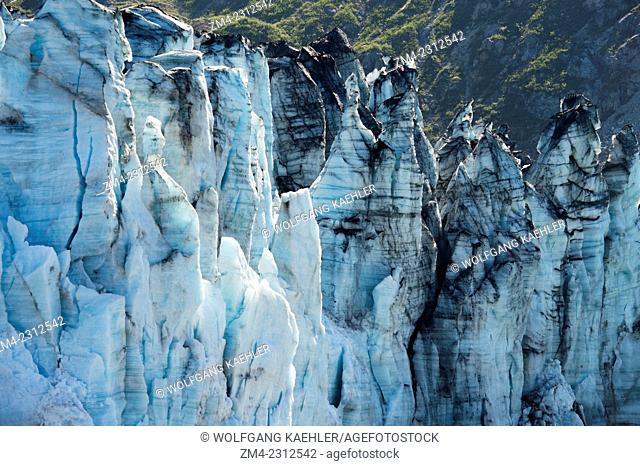 View of crevasses at the glacier face of Lamplugh Glacier in Johns Hopkins Inlet in Glacier Bay National Park, Southeast Alaska, USA