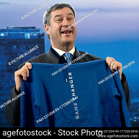 04 December 2023, Bavaria, Munich: Markus Söder (CSU), Minister President of Bavaria, takes part in a celebration to mark the 25th anniversary of the network at...