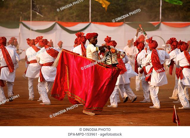 Police men in traditional attire performing Lejhim on 1 May Maharashtra state foundation day ; Shivaji park ; Dadar ; Bombay Mumbai ; Maharashtra ; India