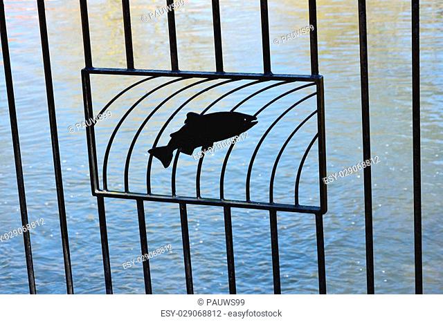 fish sillhouette on railings