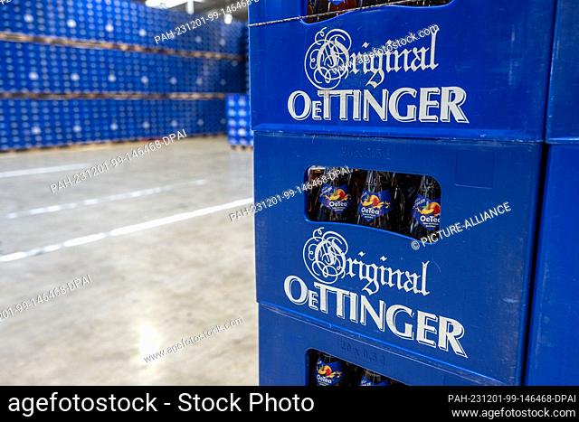 01 December 2023, Bavaria, Oettingen: There are crates of a tea drink in the Oettinger brewery. Due to the difficult situation on the German beer market