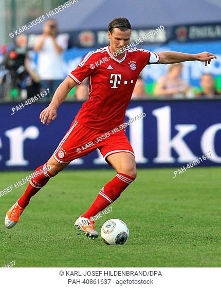 Bayerns Daniel van Buyten during a test match in Arco, Italy, 05 July 2013. From 04 until 12 July 2013 the Bundesliga team prepares for season 2013-14 in a...