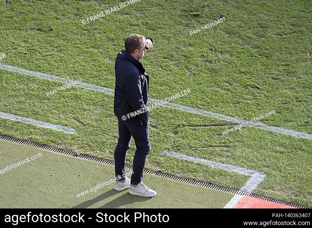 coach Hans-Dieter ""Hansi"" FLICK (M) stands on the sidelines, holds a hand over his eyes to protect himself from the sun; Prospect