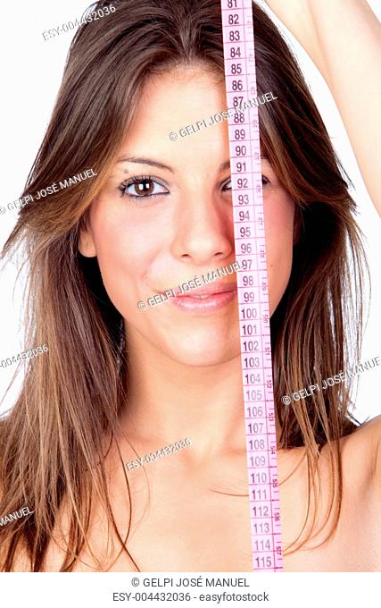 Attractive model girl with a tape-measure